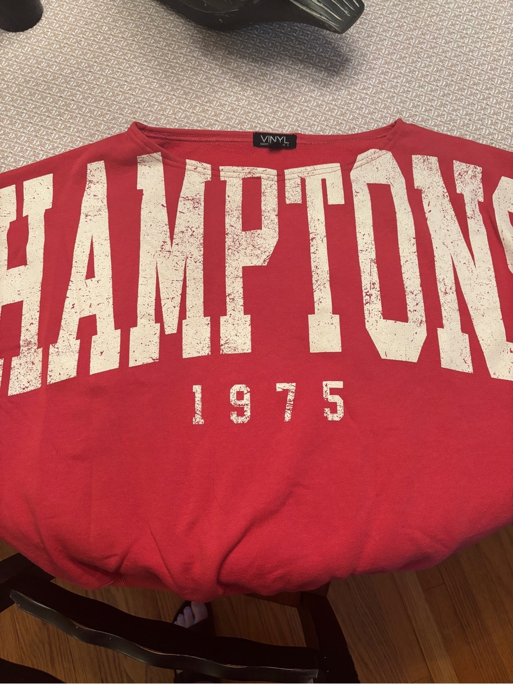 Red off the shoulder women’s sweatshirt with 'HAMPTONS' 1975 Print